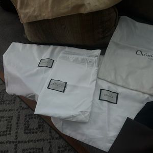 Hand bag dust bags 30 in total all names and sizes,